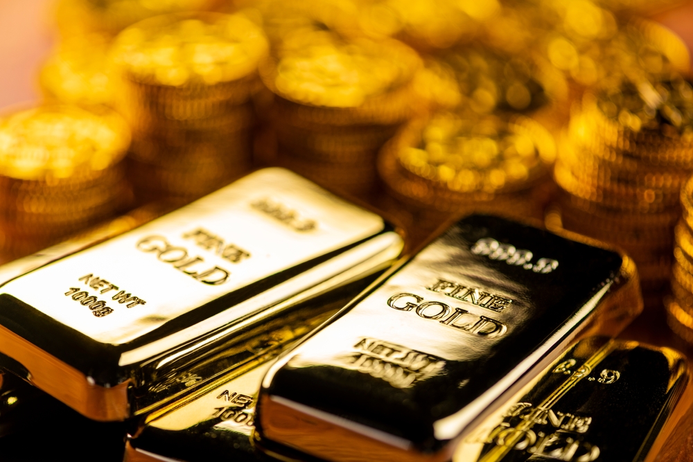Gold bars illustrating the gold and silver outlook ahead of key economic events.