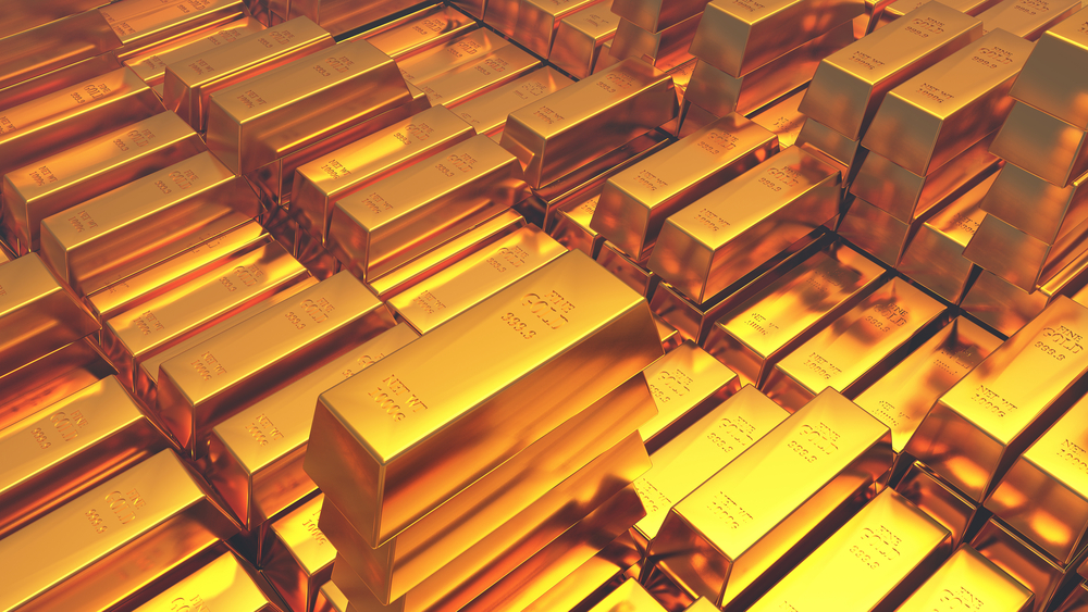Gold bars and silver coins rising as weak U.S. payroll data boosts precious metals and weakens the U.S. dollar